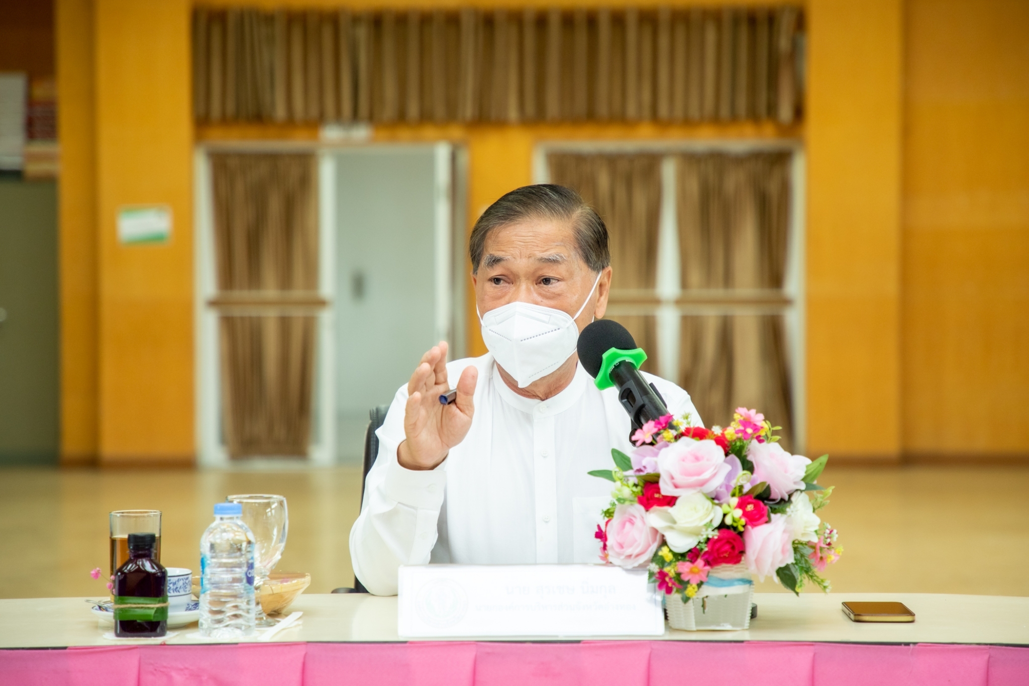 ประธานในการประชุมการดำเนินการถ่ายโอนภารกิจสถานีอนามัยเฉลิมพระเกียรติ ๖๐ พรรษา